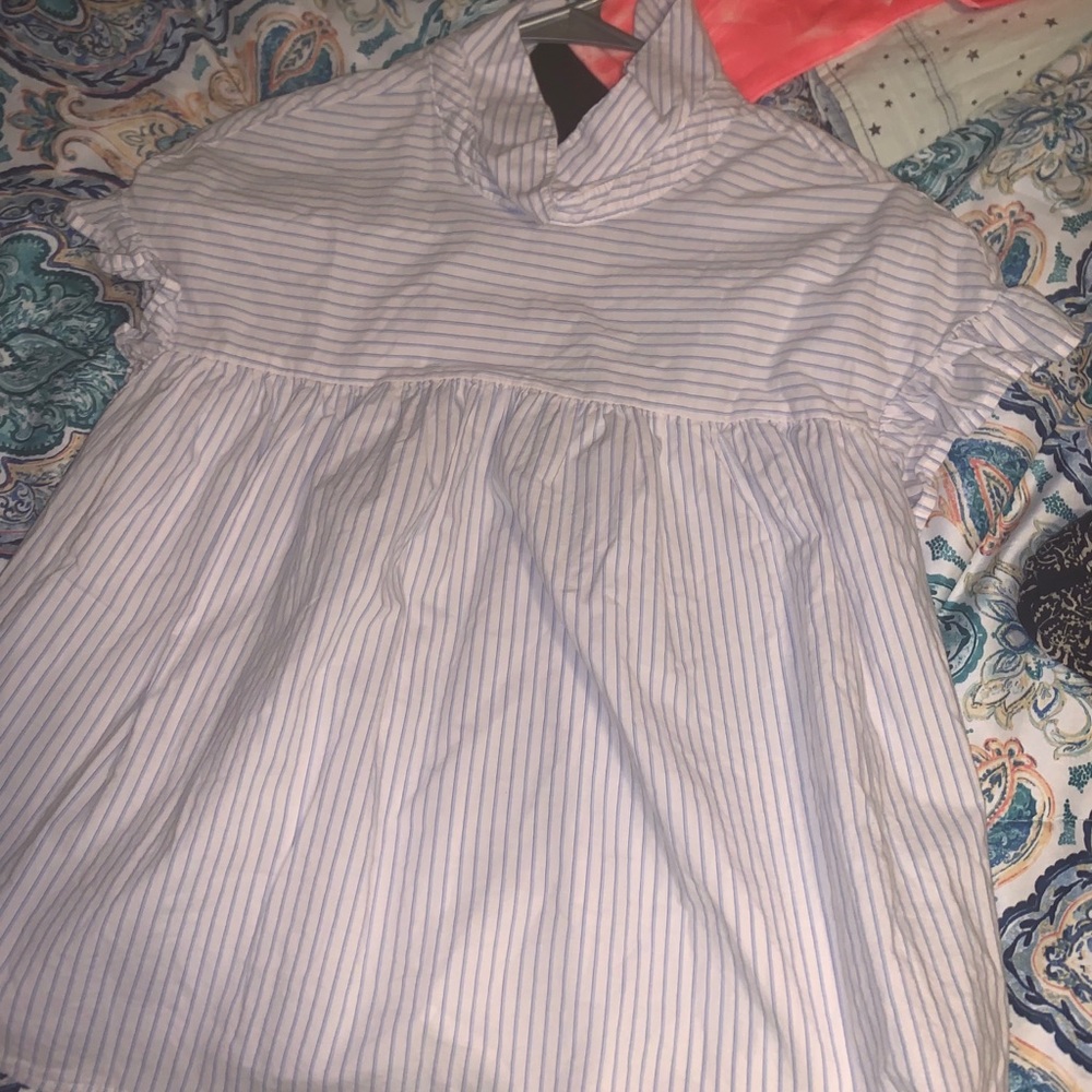 White and blue striped blouse